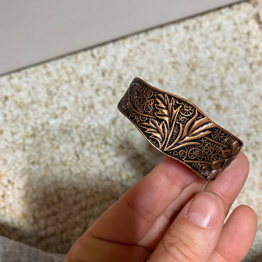 Worn copper cuff bracelet